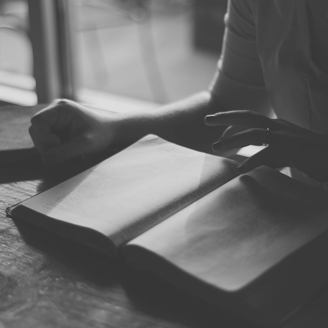 person-reading-book-with-coffee_grayscale